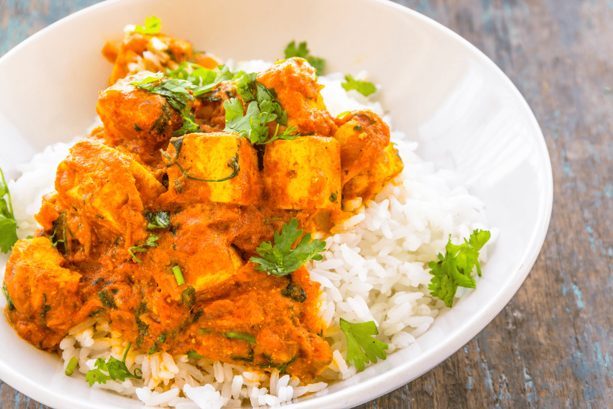 Brazilian savory pumpkin stew served over white rice